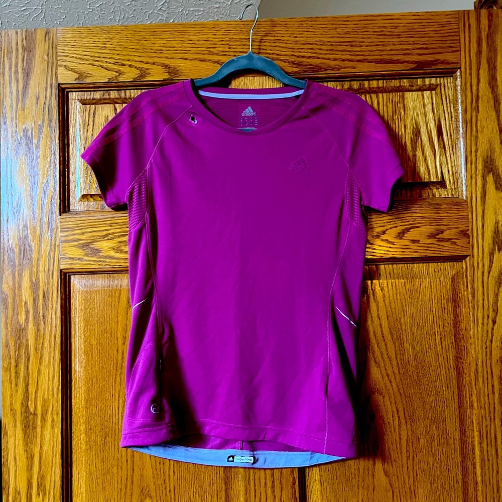 Women’s Adidas Supernova running shirt. Has small side pocket. Size M. Like new.